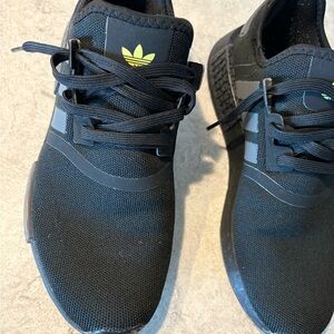 Black Sneakers with Yellow Logo